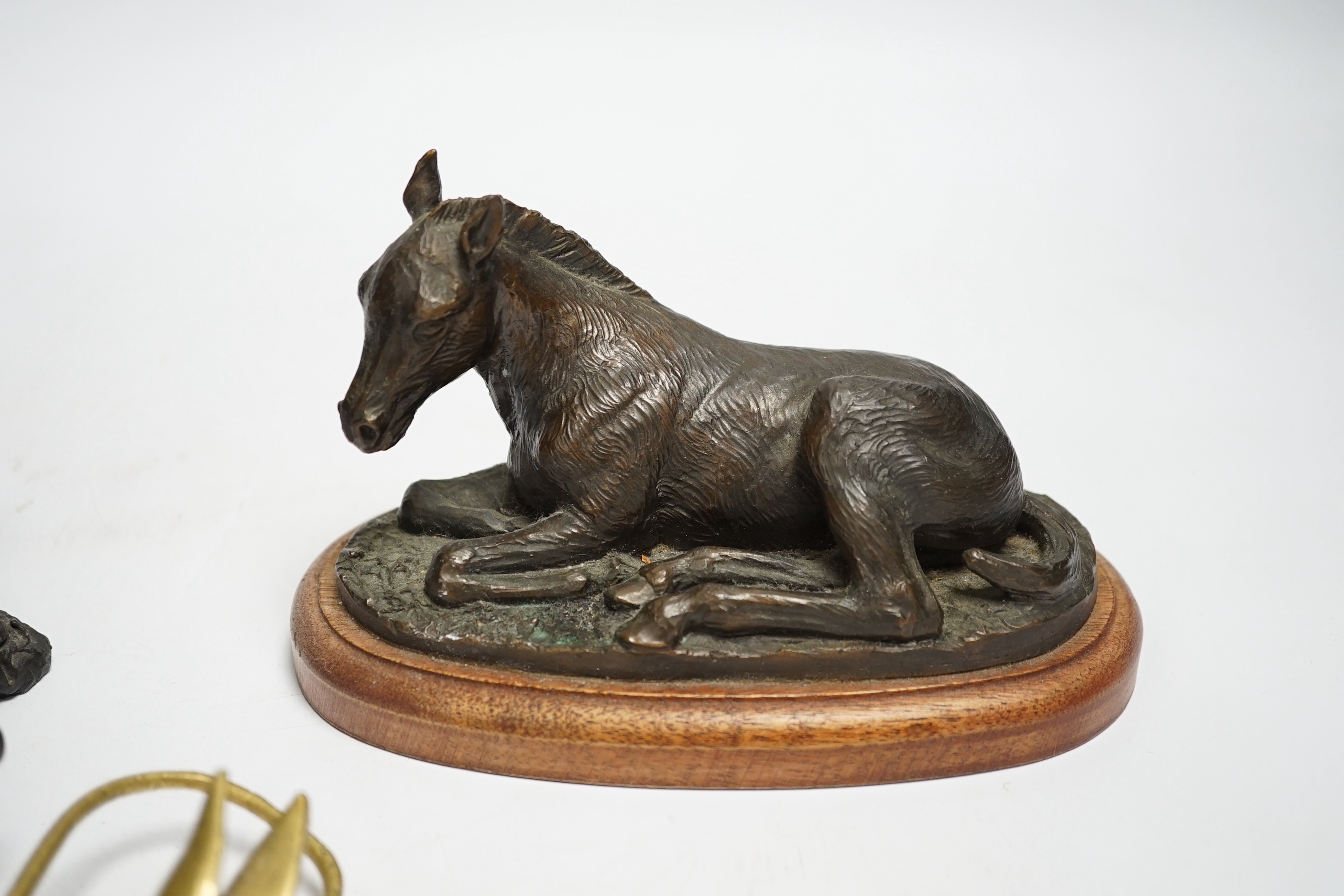 A group of metalware including two jardinieres, two brass dishes, a brass horses, head tray, a bronze of two jockeys on horseback and a bronze of a seated horse, tallest jardiniere 29cm